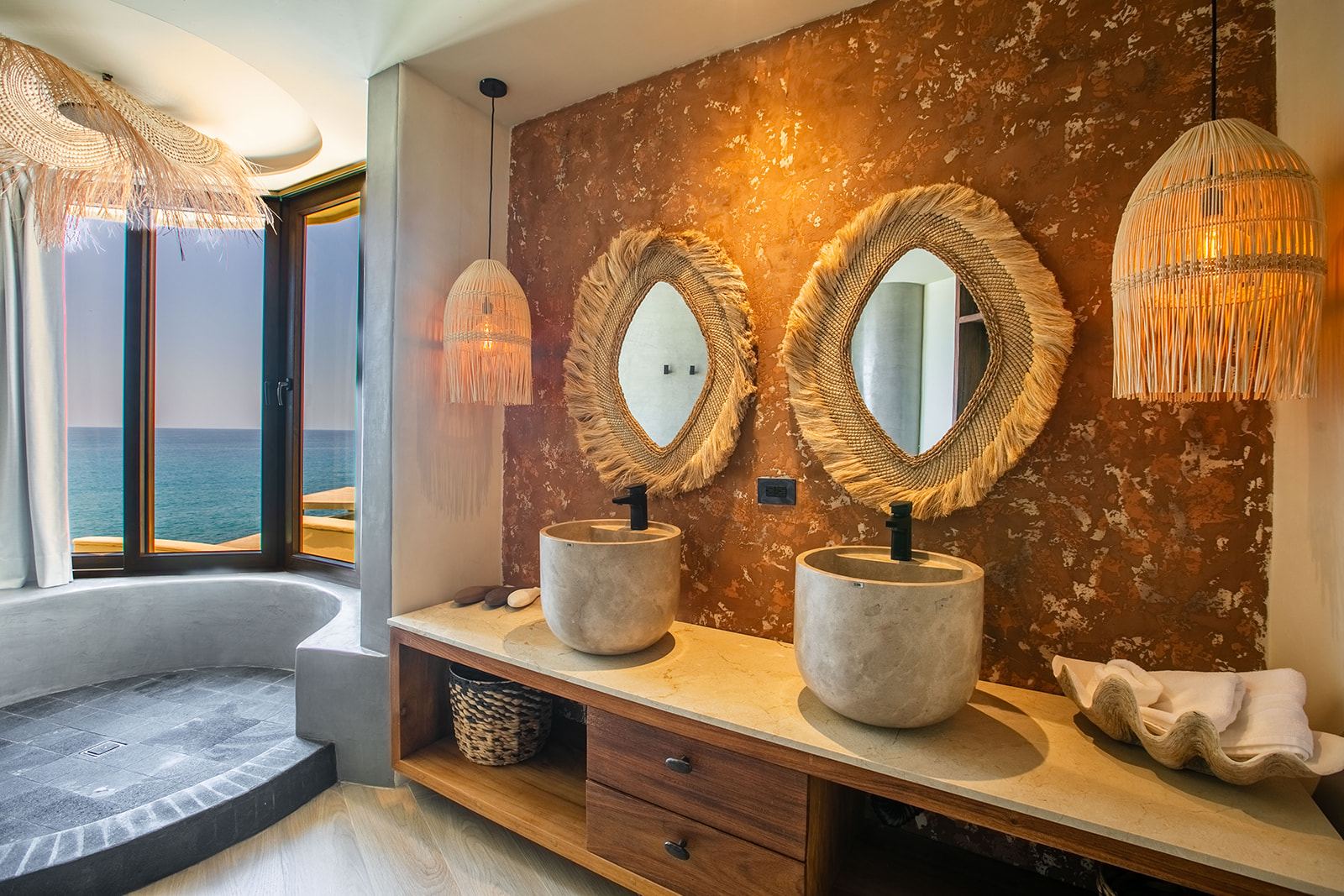 Ocean-view bathroom at Villa Caleta