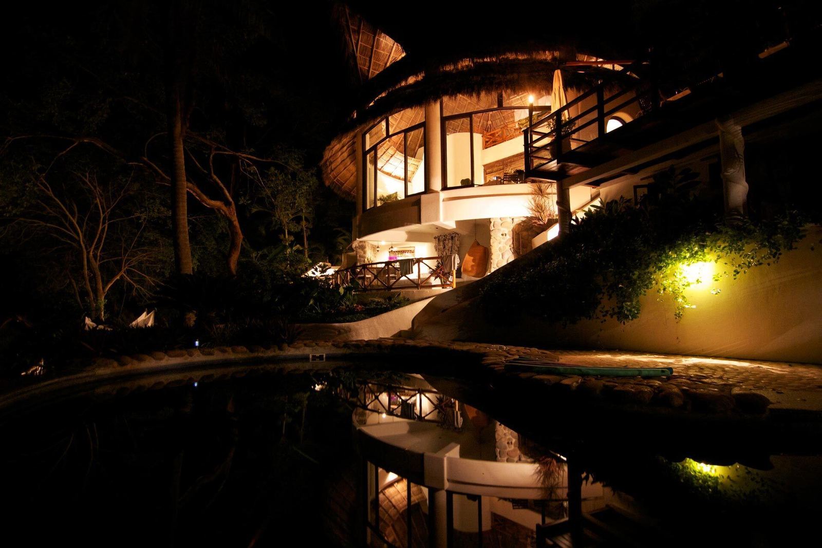 Villa Violeta at night by the pool